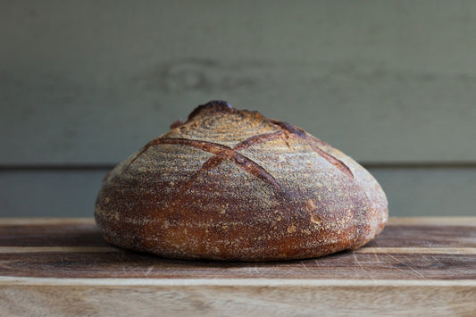 brown bread on white wooden table