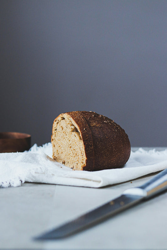 A loaf of bread sitting on top of a white plate