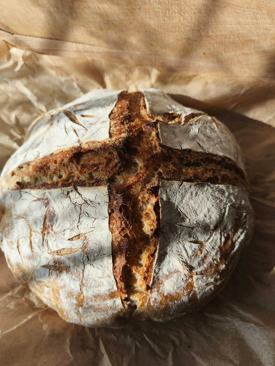 A beautiful loaf of fresh sourdough bread.
